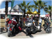 more bikes under the palms and blue skies on main street