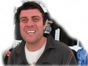 Here is Ozzy with a weird smile on his face. He was running a small tent on the parking lot of Destination Daytona, Late Rossmeyer's masterpiece Harley Store in Ormond on US-1