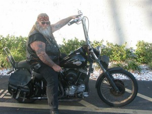 Image of biker sitting on motorcycle