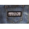 America is a Tune it must be Sung Together Patch shown on jeans