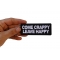 Come Crappy Leave Happy Funny Iron on Patch shown on hand for size comparison