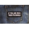 If you are Rich Then I'm Single Funny Iron on Patch shown on jeans