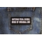 Suffering from a double dose of Original Sin Funny Iron on Patch shown on jeans