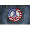 Peace Sign Patch with American Flag for Sewing on to  Jackets shown on jeans