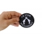 I'm Your Huckleberry Black White Iron on Novelty Patch shown on hand for size comparison