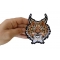 Lynx Cat Small Patch shown on hand for size comparison