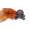 Gray Skull and Cross Bones Patch, Biker Skull Patches shown on hand for size comparison