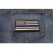 Subdued US Flag With Blue Stripe Patch shown on jeans