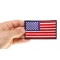 US Flag Patch 4 Inch Black Border shown on hand for size comparison