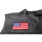 US Flag Patch 4 Inch Black Border - 4x2.5 inch. Embroidered Iron on Patch shown on leather vest