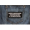Invest in Investigating the Investigators of the Investigation Funny Iron on Patch shown on jeans