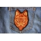 Brown Wolf Patch shown on jeans
