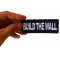 Build The Wall Patch Build The Wall Patch, Patriotic Saying Patches shown on hand for size comparison