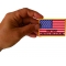 United We Stand 91101 Flag Patch shown on hand for size comparison