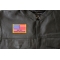 United We Stand 91101 Flag Patch - 3x2 inch. Embroidered Iron on Patch shown on leather vest