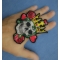Hearts Queen Skull Patch shown on hand for size comparison