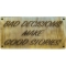 Bad Decisions Make Good Stories Wood Sign  shown on hand for size comparison