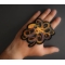 Octopus Patch shown on hand for size comparison