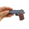 9 Mm Gun With US Flag Patch 9 Mm Gun With US Flag Patch shown on hand for size comparison