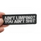 Ain't Limping Aint Shit Funny Patch | Embroidered Patches Ain't Limping Aint Shit Patch, Biker Saying Patches shown on hand for size comparison