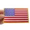 American Flag Patch with Yellow Borders American Flag Patch with Yellow Borders shown on hand for size comparison