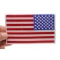 American REVERSED Flag Patch with White Borders shown on hand for size comparison