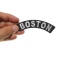 Boston Patch shown on hand for size comparison