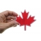 Canada Maple Leaf Patch Canada Maple Leaf Iron on Patch shown on hand for size comparison