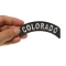 Colorado Patch Iron on State Rocker shown on hand for size comparison
