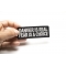 Danger Is Real Fear Is A Choice Patch, Biker Saying Patches shown on hand for size comparison