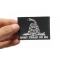 Don't Tread On Me Black White Patch | US Military Veteran Patches Don't Tread On Me Black White Patch shown on hand for size comparison