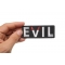 Evil Patch With Devil Horns | Embroidered Patches Evil Patch With Devil Horns shown on hand for size comparison