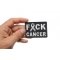FCK Cancer White Ribbon Patch | Embroidered Patches FCK Cancer White Ribbon Patch shown on hand for size comparison