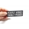 Heavily Armed Easily Pissed Patch | Embroidered Patches Heavily Armed Easily Pissed Funny Iron on Patch shown on hand for size comparison