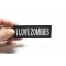 I Love Zombies Patch | Embroidered Patches I Love Zombies Funny Iron on Patch shown on hand for size comparison