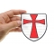 Knights Templar Shield Patch shown on hand for size comparison