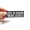 Life Is Good With Jesus Patch shown on hand for size comparison