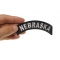Nebraska Patch Nebraska Patch Iron on State Rocker shown on hand for size comparison