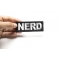 Nerd Patch Nerd Funny Iron on Patch shown on hand for size comparison