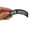 New Jersey Patch New Jersey Patch Iron on State Rocker shown on hand for size comparison