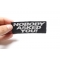 Nobody Asked You Patch, Saying Patches shown on hand for size comparison