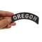 Oregon Patch Oregon Patch Iron on State Rocker shown on hand for size comparison
