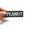 Peanut Patch Peanut Funny Iron on Patch shown on hand for size comparison