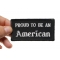 Proud To Be An American Patch, Patriotic Saying Patches shown on hand for size comparison