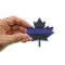 Thin Blue Line Canadian Maple Leaf Patch shown on hand for size comparison