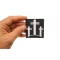Three Crosses Christian Patch shown on hand for size comparison