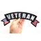 Veteran Top Rocker Patch With US Flag | US Military Veteran Patches Veteran Patch, US Flag Large Rocker Patch shown on hand for size comparison