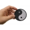 Ying Yang Novelty Iron on Patch shown on hand for size comparison