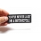 You're Never Lost On A Motorcycle Patch, Biker Saying Patches shown on hand for size comparison