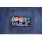 Boobies Rule Patch Boobies Rule Funny Iron on Patch shown on jeans